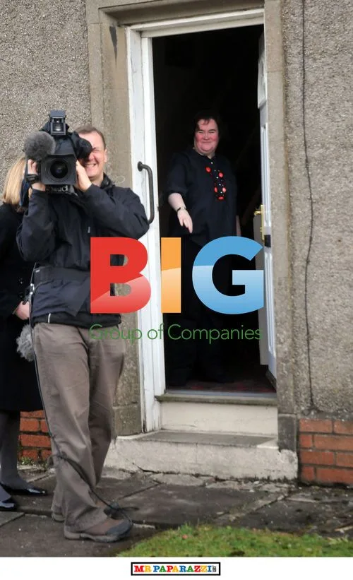 Susan Boyle Waves After Break-In