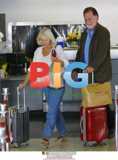 Helen Mirren and Taylor Hackford at LAX
