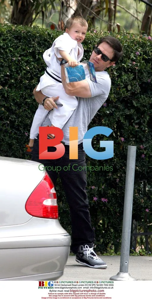 Mark Wahlberg and son at toy shop