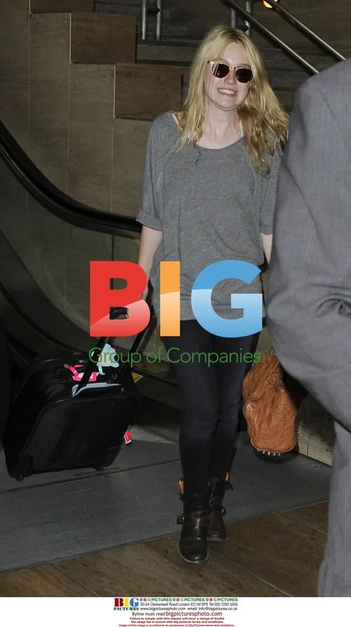 Dakota Fanning Arrives at LAX