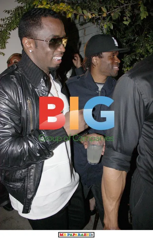 Diddy and Ray J leaving Diddy's party