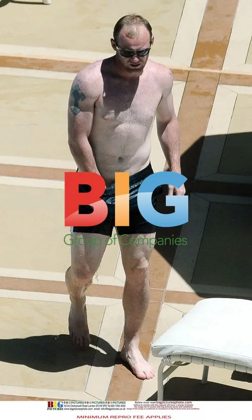 Wayne and Coleen Rooney Poolside