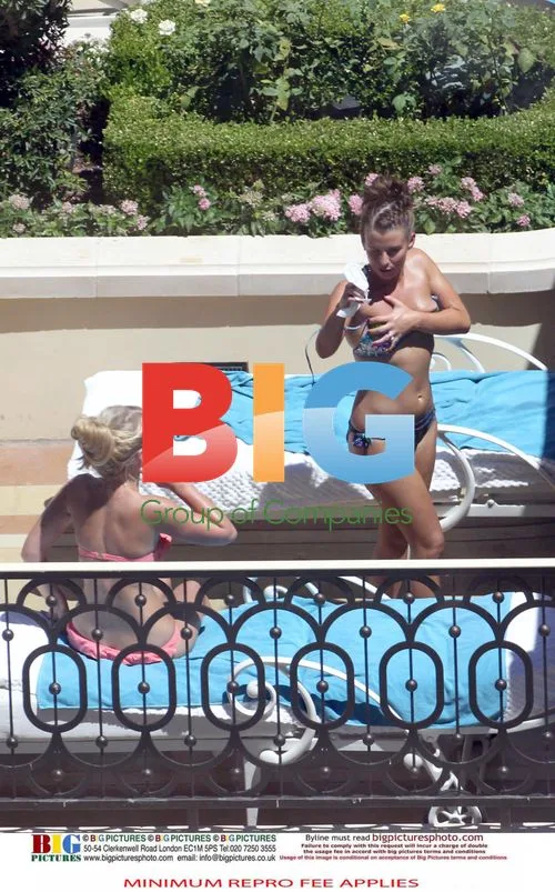 Rooney Relaxing Poolside with Friends