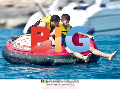 Gerard Pique relaxes with friends in Spain