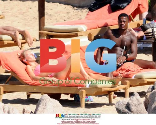 Patrice Evra relaxes with girlfriend