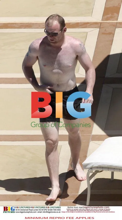 Wayne Rooney and Coleen Rooney Poolside in Vegas