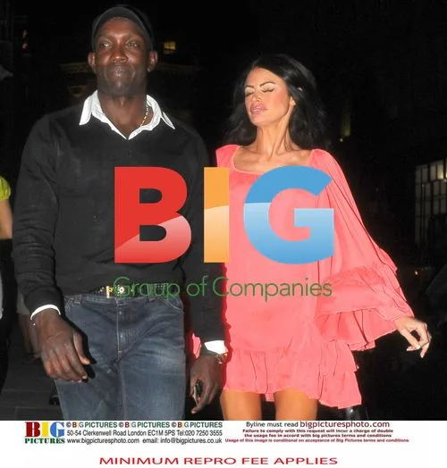 Dwight Yorke with mystery woman