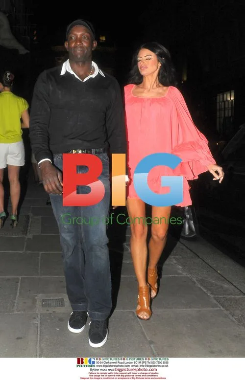 Dwight Yorke with mystery woman