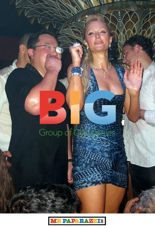 Paris Hilton and Boyfriend in Champagne Showdown