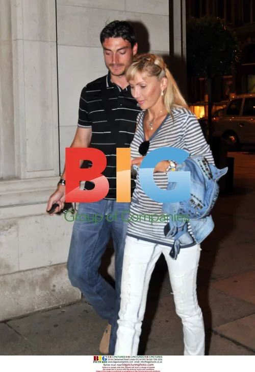 Albert Riera Leaves Restaurant With Wife