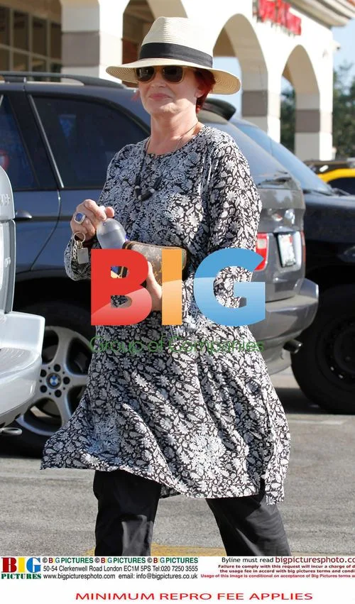 Ozzy Osbourne Leaves Drug Store with Enema