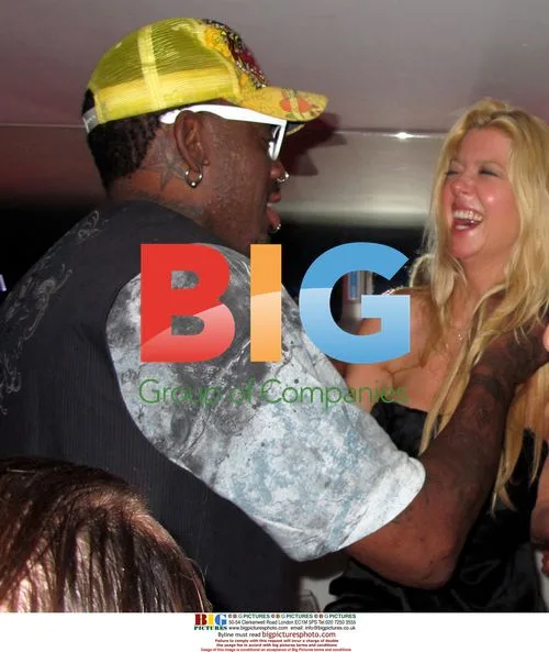 Tara Reid and Dennis Rodman at VIP Room Nightclub