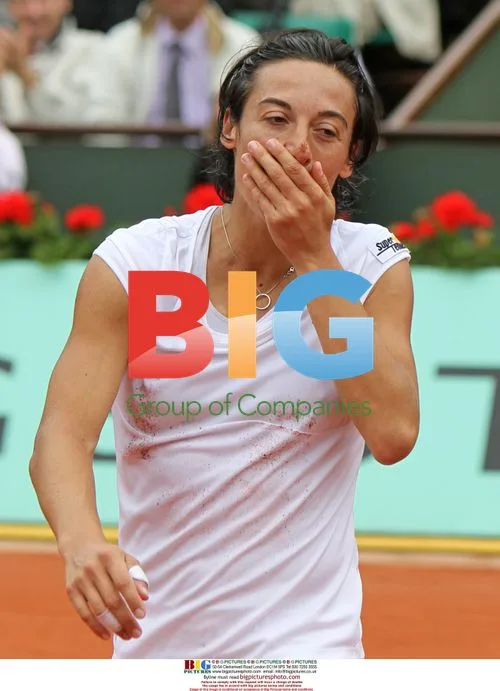 Francesca Schiavone hits shot at French Open