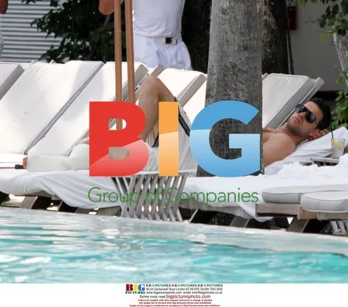Michael Ballack sunbathing with wife Simone in Miami