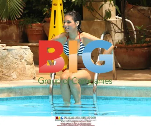 Roxanne Pallette Relaxes Poolside in Malta
