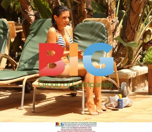 Roxanne Pallette Relaxes Poolside in Malta