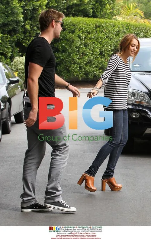 Miley Cyrus and Liam Hemsworth Take a Walk