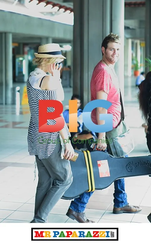 Brian Mcfadden and Delta Goodrem at Bali airport