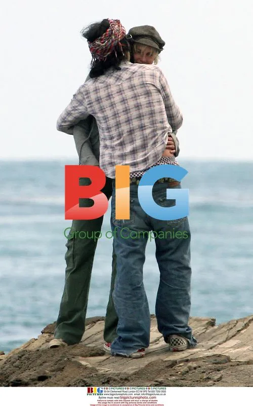 Daryl Hannah and boyfriend on beach in Malibu