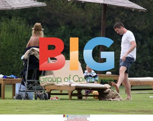 Claudine and Robbie Keane with son in Sardinia