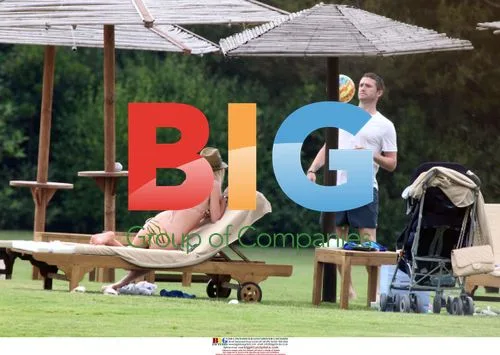 Claudine and Robbie Keane with son in Sardinia
