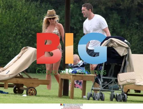 Claudine and Robbie Keane with son in Sardinia
