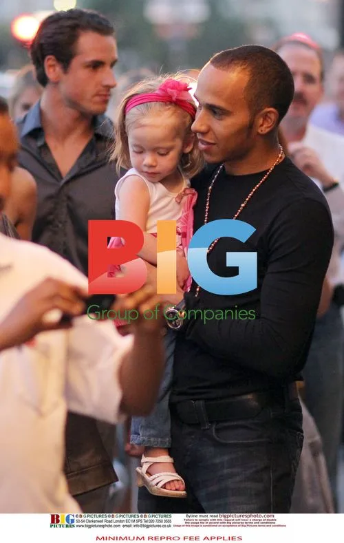Nicole Scherzinger and Lewis Hamilton with Girl