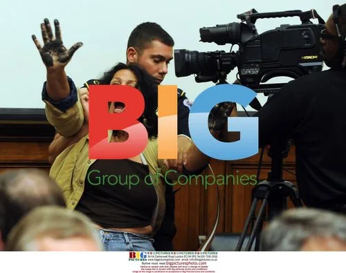 Protester at Congressional Hearing on BP Oil Spill