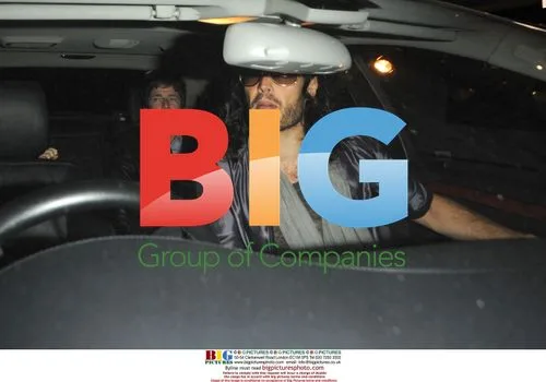 Russell Brand, Noel Gallagher and Sarah McDonald at Zuma restaurant