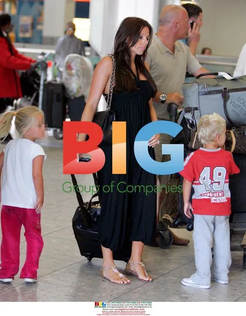 Toni Terry and family arrive at Heathrow