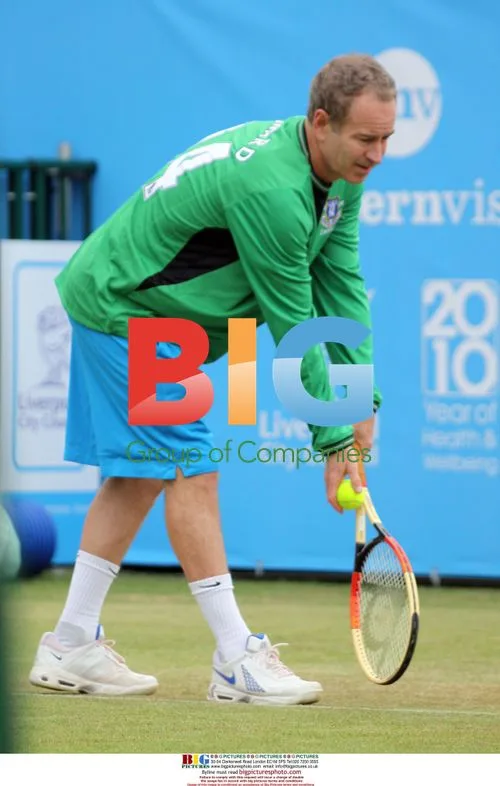 John Mcenroe vs Martina Hingis at Liverpool Tennis