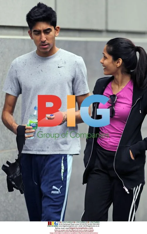 Slumdog Millionaire Couple Out in Rain