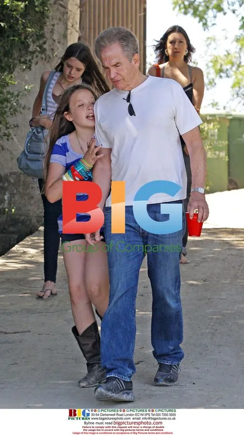 Warren Beatty and daughters outside LA home
