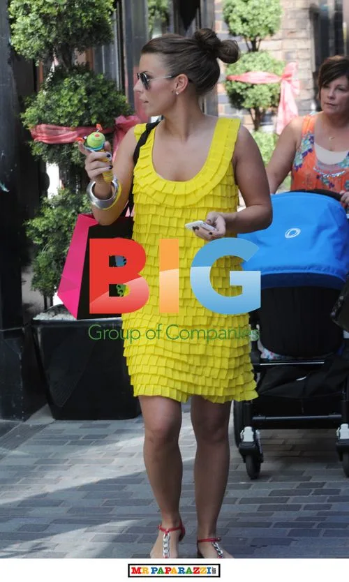 Coleen Rooney Shops in Yellow Dress