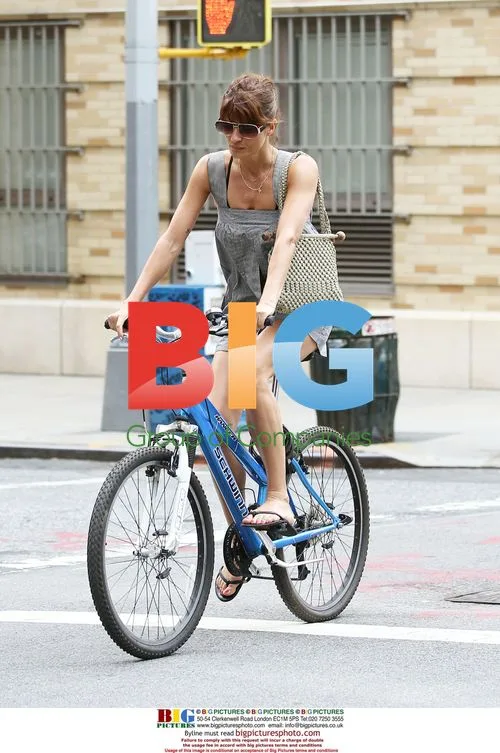 Helena Christensen Rides Bike in NYC