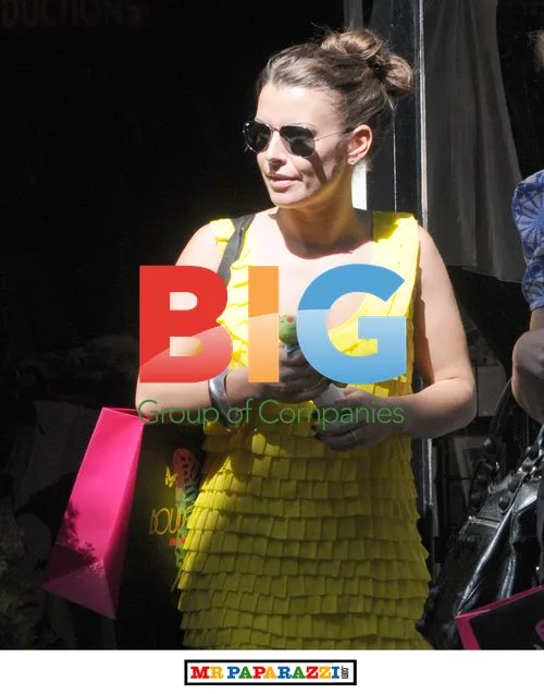 Coleen Rooney Shops in Yellow Dress