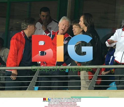 Bill Clinton and Mick Jagger at 2010 World Cup