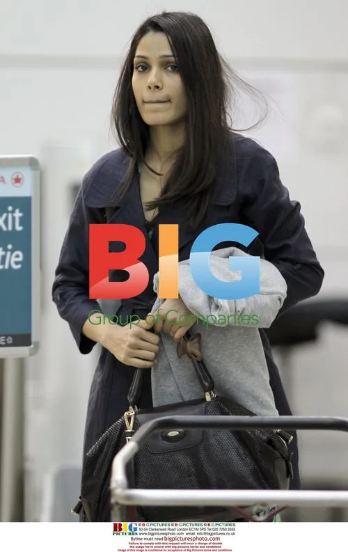 Freida Pinto Arrives at Vancouver Airport