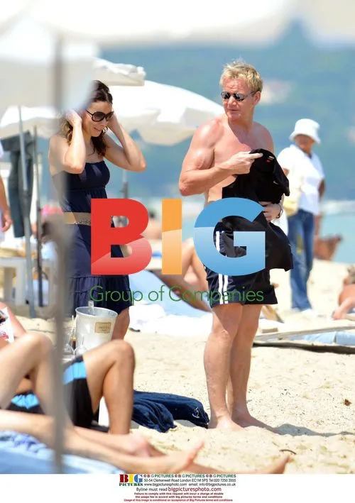 Gordon Ramsay Strolls on Beach with Wife