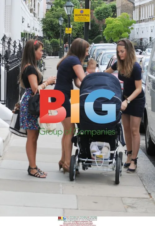 Carly and Joe Cole out to lunch with baby and friends