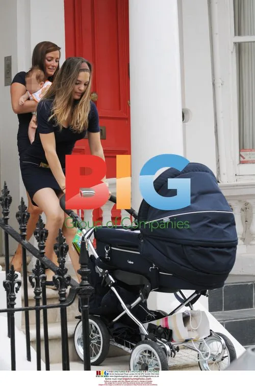 Carly and Joe Cole out for lunch with baby and friends