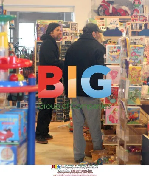 Brad Pitt Shops with Friend