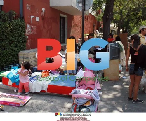 Earthquake victims create sidewalk home in Chile