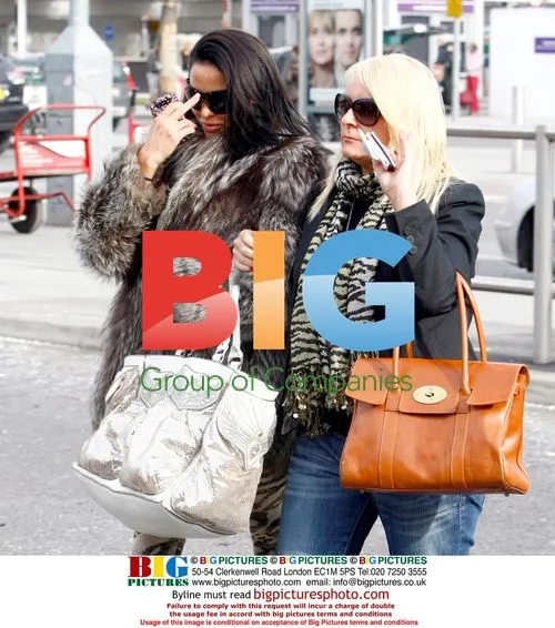 Katie Price Leaves Heathrow