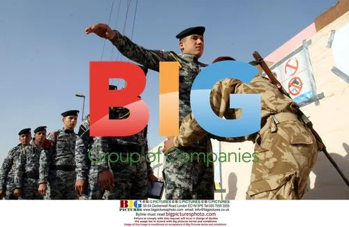 Iraqi security frisks police before voting