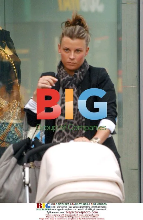 Coleen Rooney Out Shopping with Baby Kai