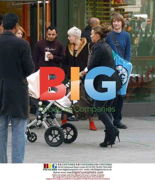 Coleen Rooney Out with Baby Kai
