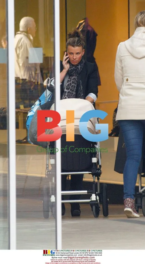 Coleen Rooney out with baby Kai