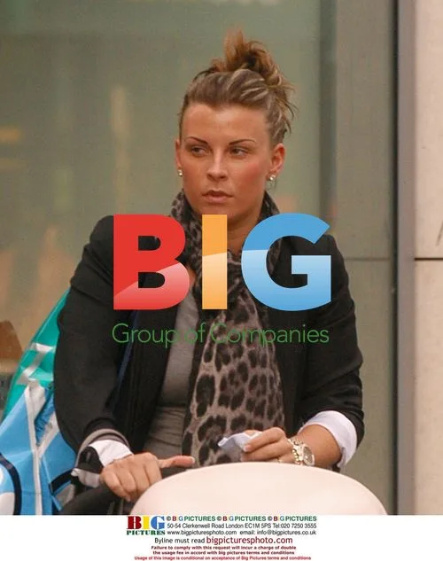 Coleen Rooney Out Shopping with Baby Kai