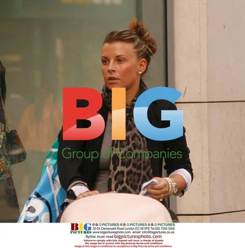 Coleen Rooney out with baby Kai